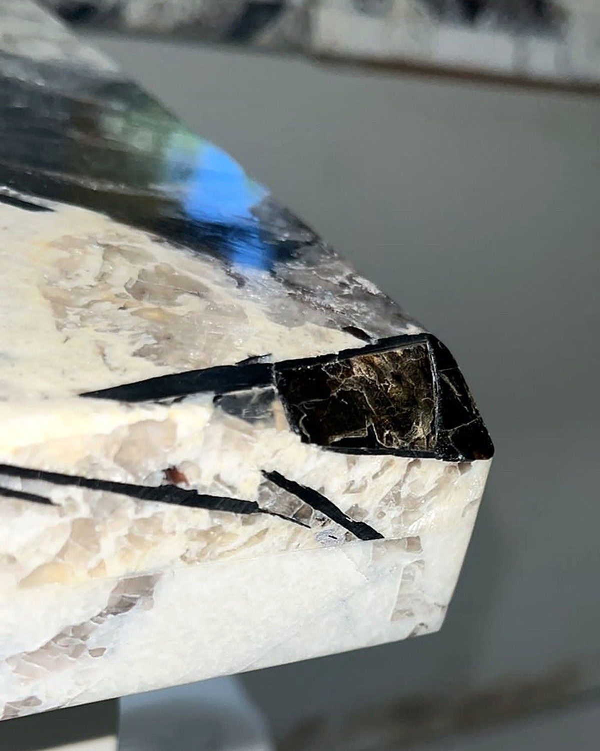 Before: damaged granite vanity corner