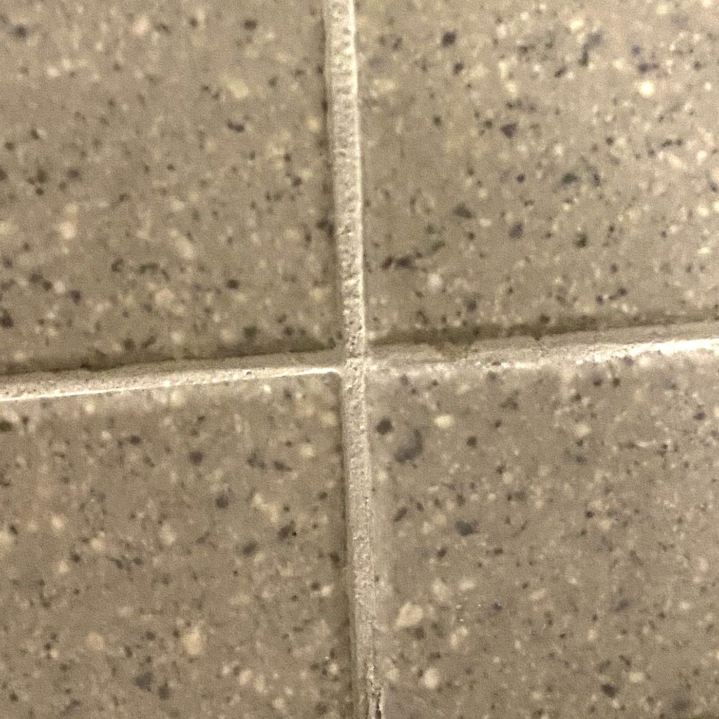 After: chipped wall tile repaired
